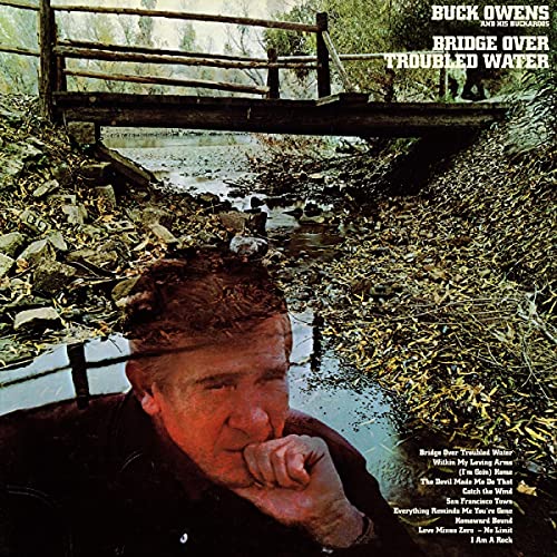 BUCK OWENS & HIS BUCKAROOS - BRIDGE OVER TROUBLED WATER (CLEAR VINYL)